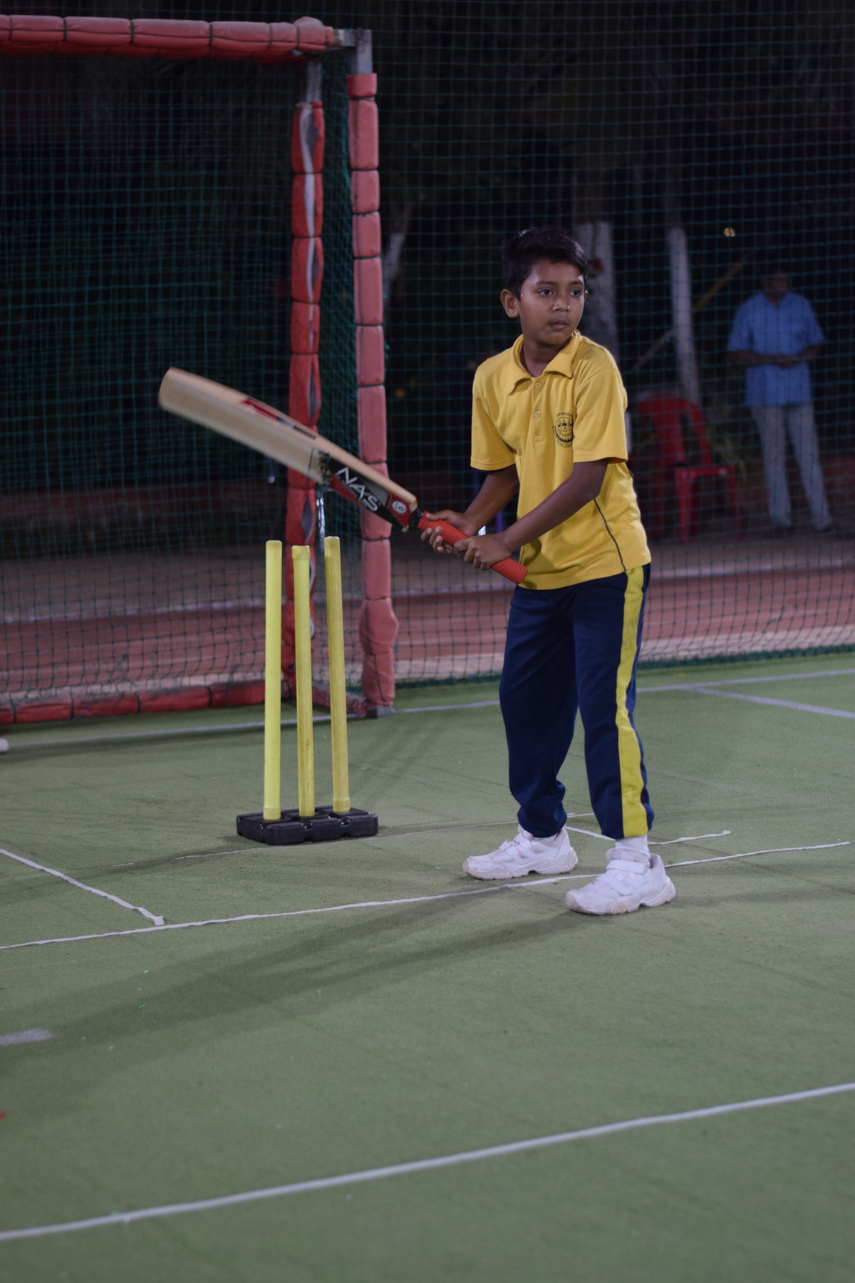 Student playing cricket at Josh 2023 at dg school