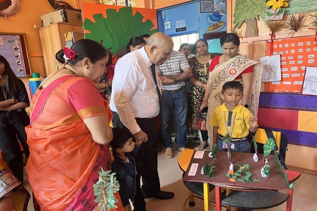 Preprimary Student Presenting his Project to the dignitaries